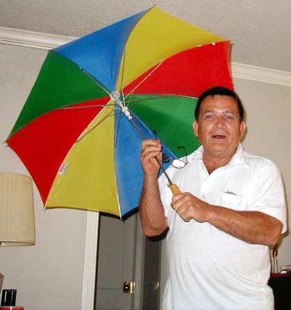 Dad dances with his umbrella